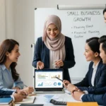 A professional team discussing accounting services for small business growth while viewing financial data.